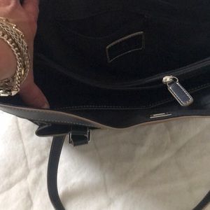 This is a brand new purse never used but without tags